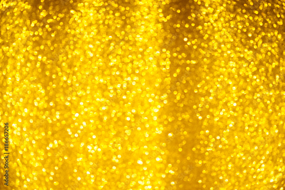 Gold glitter background. Shiny bright yellow christmas lighs bokeh. Stock  Photo | Adobe Stock