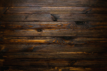Natural rustic wood background. Wood texture. Table of blank dark rustic planks top flat lay view.