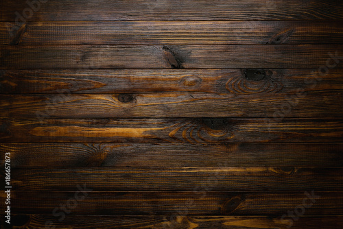 Natural rustic wood background. Wood texture. Table of blank dark rustic planks top flat lay view.