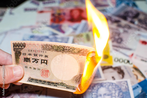 Burning Japanese money photo