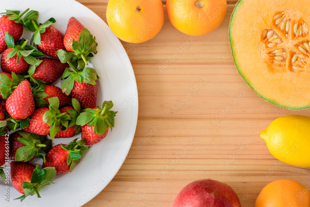 Fruit layflat on wooden table Fruit layflat on wooden table
