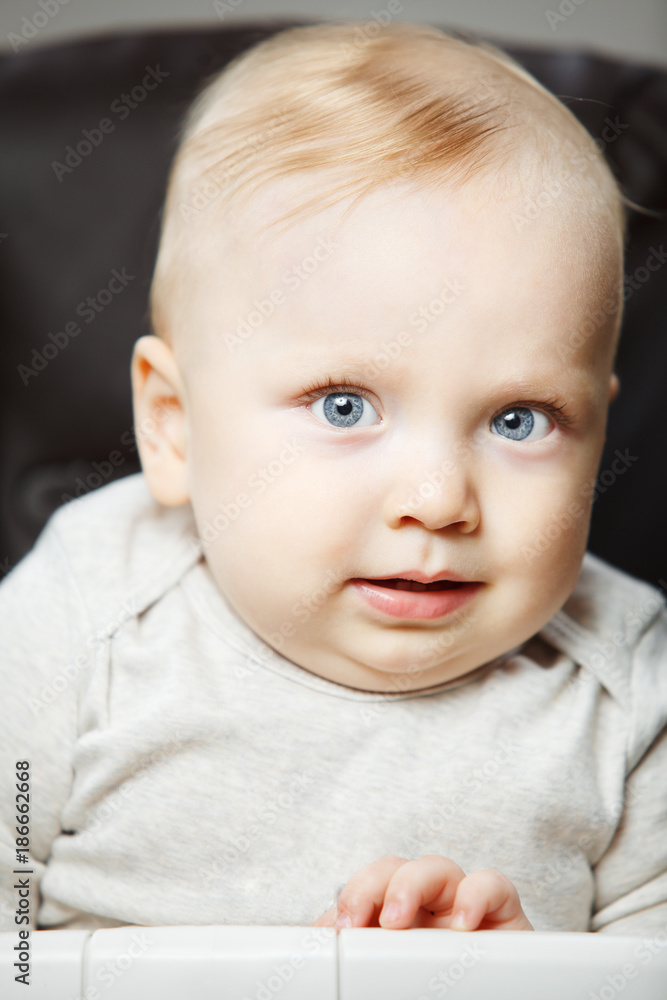 Baby boy with angelic look and beautiful eyes portrait photo Baby boy with angelic look and beautiful eyes portrait photo