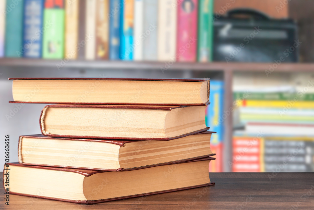 Books on the background of the shelf Books on the background of the shelf