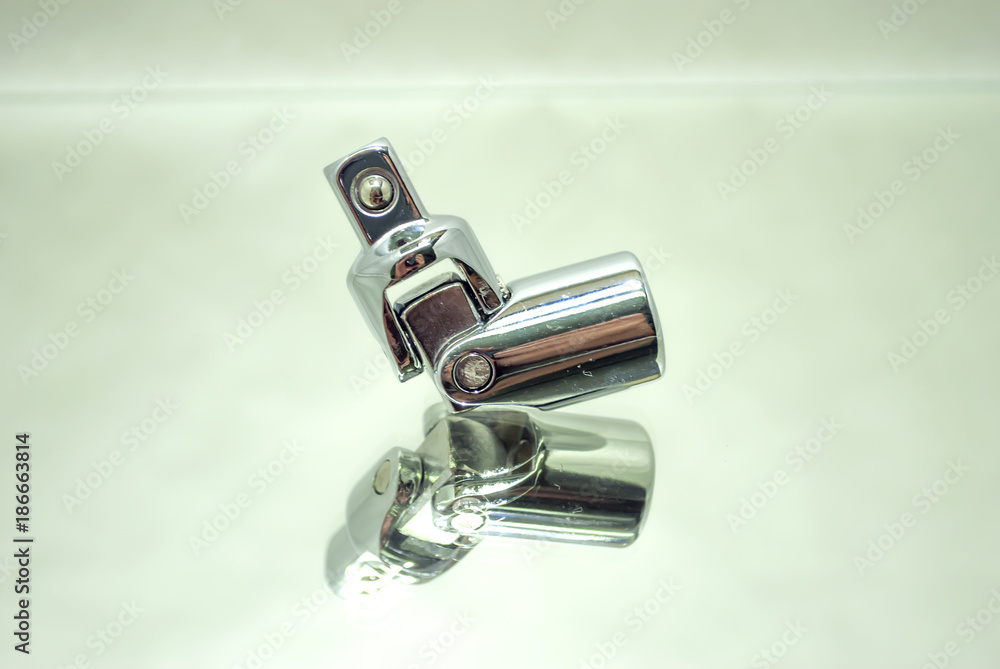 ratchet socket wrench angle coupling closeup on mirror ratchet socket wrench angle coupling closeup on mirror