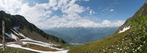 Fototapeta Naklejka Na Ścianę i Meble -  Mountain peaks of the Alps in the snow at summer