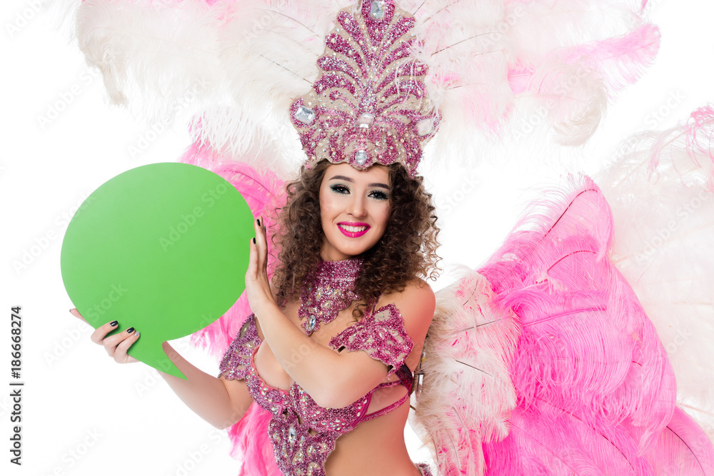 woman in carnival costume holding blank green text balloon, isolated on white woman in carnival costume holding blank green text balloon, isolated on white