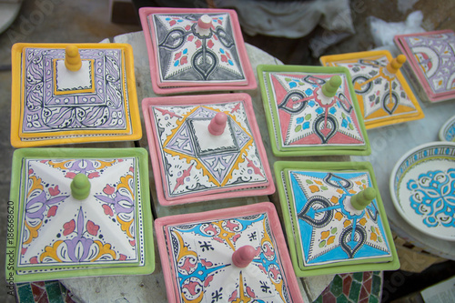 street life morocco marrakech medina making mosaic and painting and making ceramic pots manual labor photo