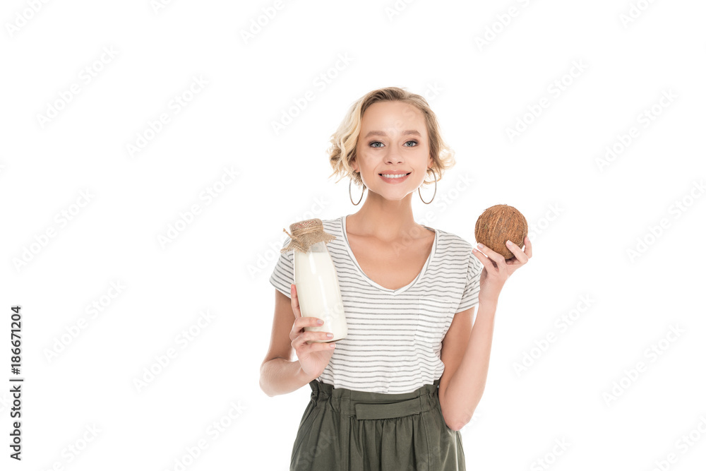 portrait of smiling woman with coconut and coconut milk isolated on white portrait of smiling woman with coconut and coconut milk isolated on white