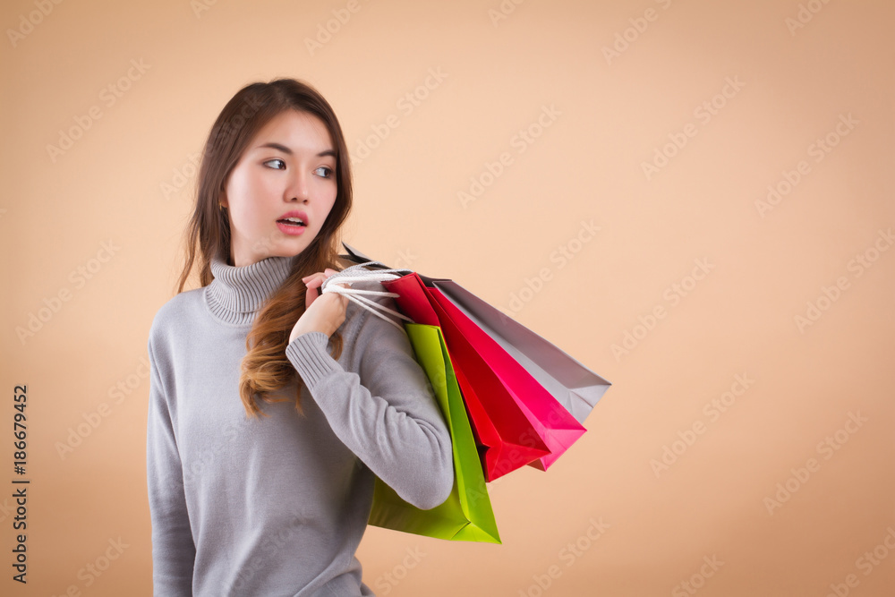 happy, excited woman shopper or customer with shopping bag happy, excited woman shopper or customer with shopping bag