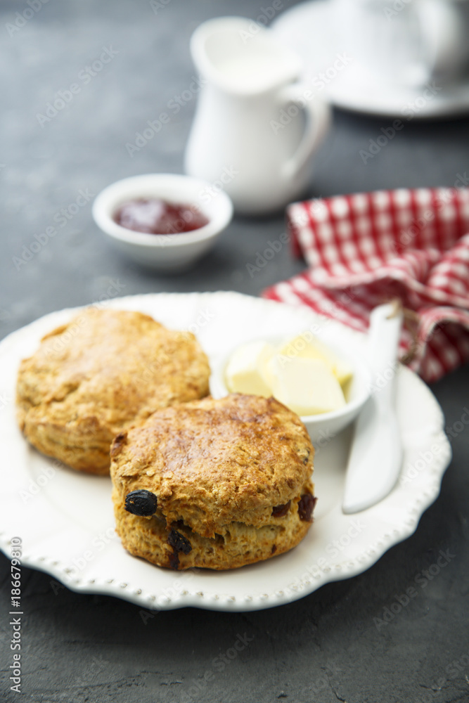 Fresh homemade scones with butter and jam Fresh homemade scones with butter and jam