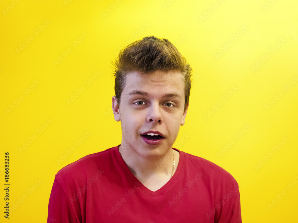 Portrait of a talking man in studio yellow background Portrait of a talking man in studio yellow background