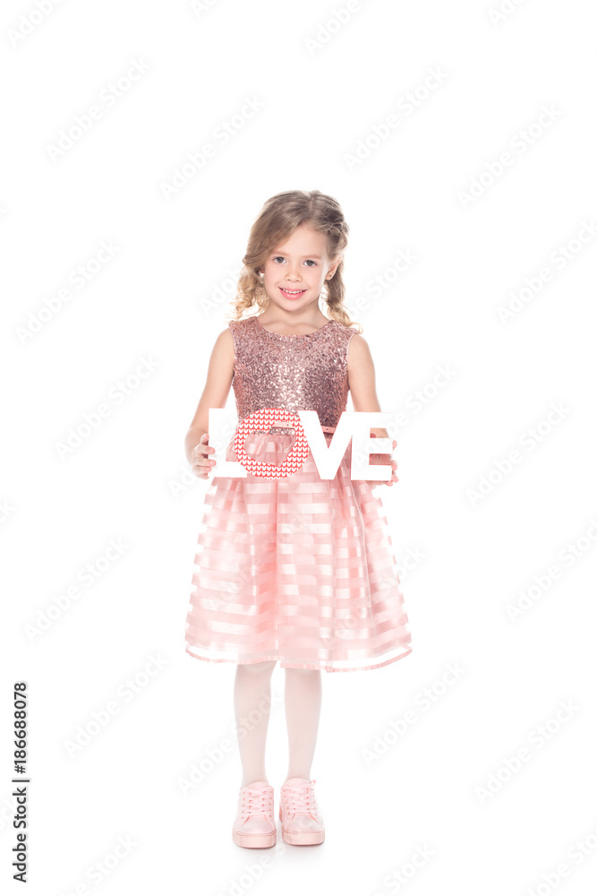 beautiful kid holding love symbol for valentines day, isolated on white beautiful kid holding love symbol for valentines day, isolated on white