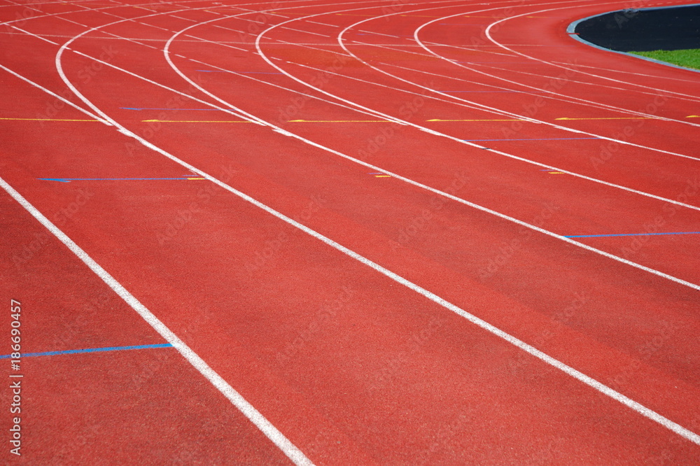texture of run red track way in sport competition  stadium background