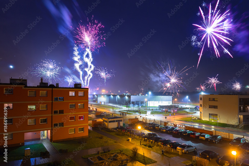 Fototapeta premium Fireworks display on New Years Eve in Pruszcz Gdanski, Poland