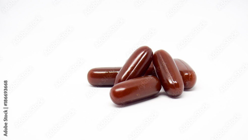 Brown pill with white background. Brown pill with white background.