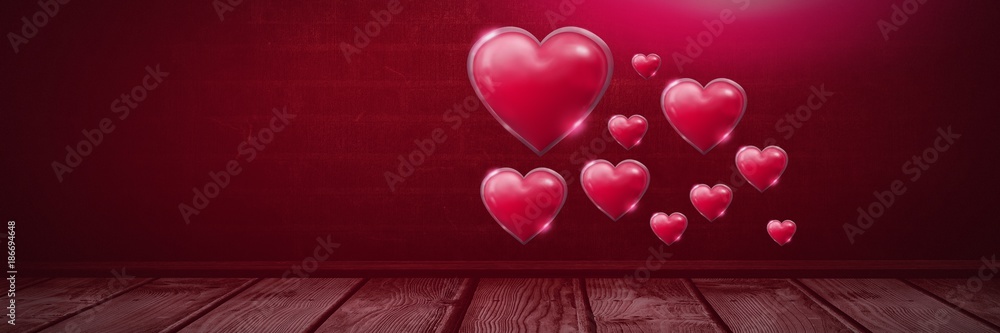 Shiny bubbly Valentines hearts over wooden floor
