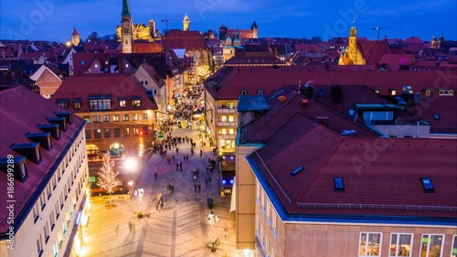 Nuremberg aerial night cityscape. Time lapse. Zoom effect photo