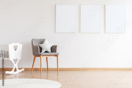 Empty posters on white wall