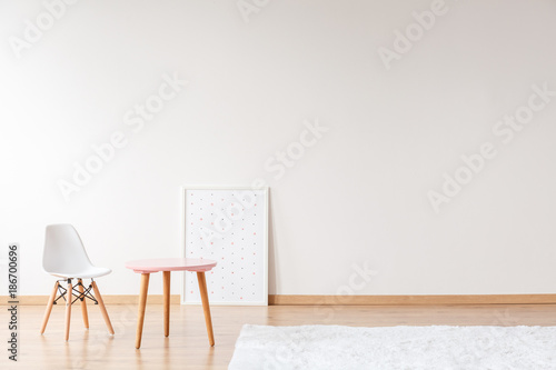 Empty room with small furniture