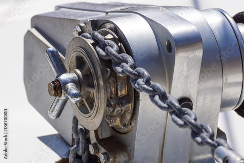 Anchor windlass mechanism with chain on ship deck