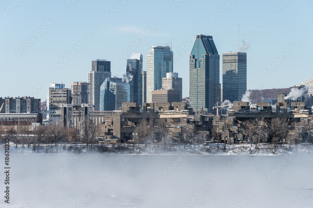 Montreal Skyline in winter as ice fog rises off the St. Lawrence River (January 2018)