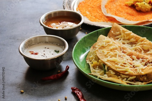 Cheese Dosa / Indian breakfast crepes with cheese potato filling, selective focus photo