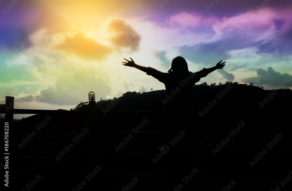 Thank God,dark shadow or silhouette women welcome world with freedom gesture