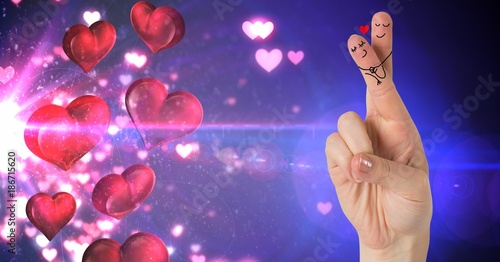 Valentine's fingers love couple and hearts floating from light