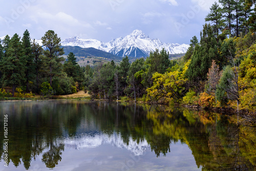 Fototapeta Naklejka Na Ścianę i Meble -  Beautiful and Colorful Colorado Rocky Mountain Autumn Scenery - San Juan Mountains With Lake and Autumn Color