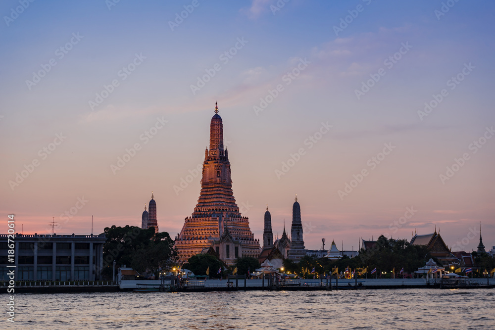Wat Arun Temple at sunset twilight with floating lanterns in bangkok,Thailand. Wat Arun Temple at sunset twilight with floating lanterns in bangkok,Thailand.