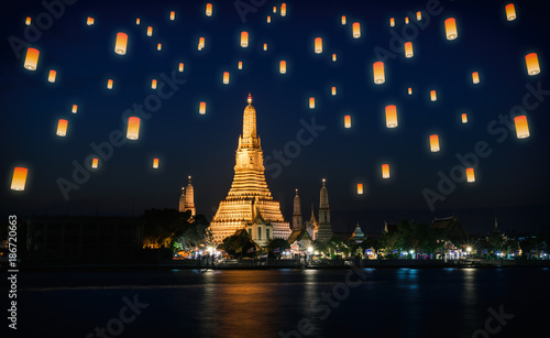 Wat Arun Temple at sunset  twilight with floating lanterns in bangkok,Thailand. © Success Media