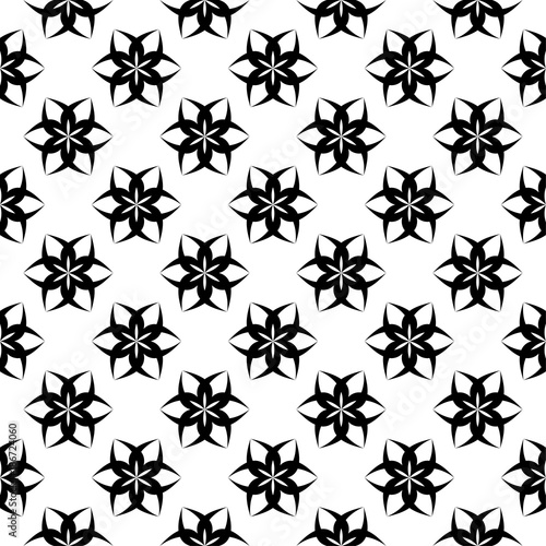 Black floral seamless pattern on white background © Liudmyla