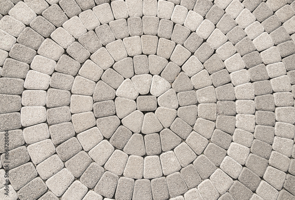 cobblestone pavement with circular pattern useful for background cobblestone pavement with circular pattern useful for background