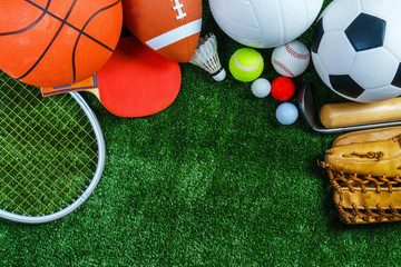 Sports Equipment on green grass, Top view