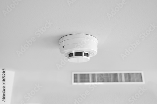 Smoke detector mounted on the ceiling in hospital