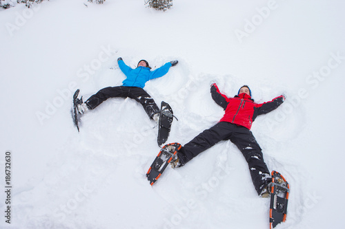 Kids making snow angels in Canada
