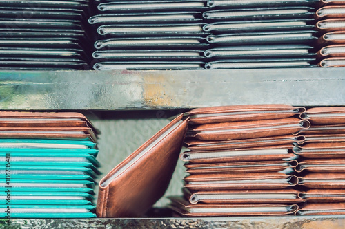 Stack of menus lying on wooden background photo