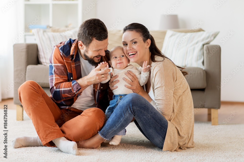 happy family with baby having fun at home