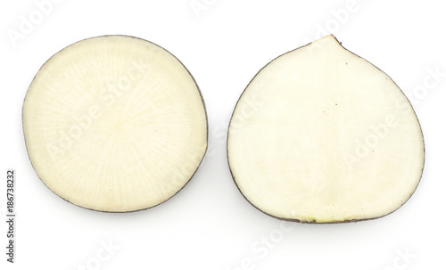 Black radish two halves compare top view isolated on white background.