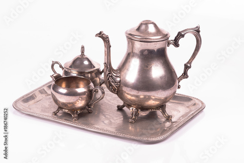 art deco silver sugar bowl and teapot on a tray