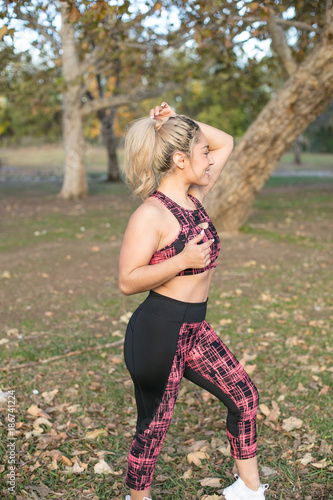 Young woman exercising in park