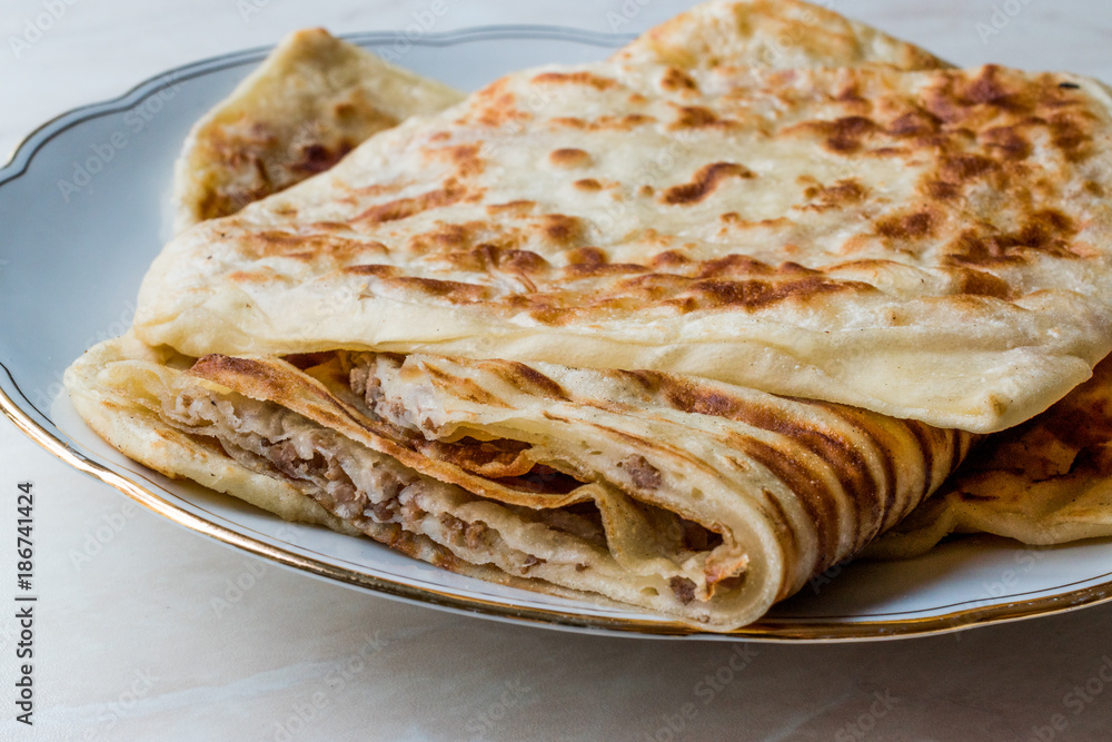 Traditional Qutab or Gozleme made with Dough, Minced Meat or Cheese
