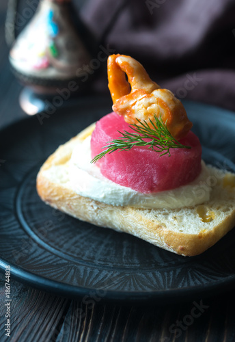 Sandwich with tuna, crab claw and mozzarella photo