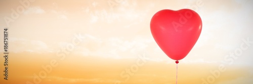 Composite image of valentines day heart balloon 