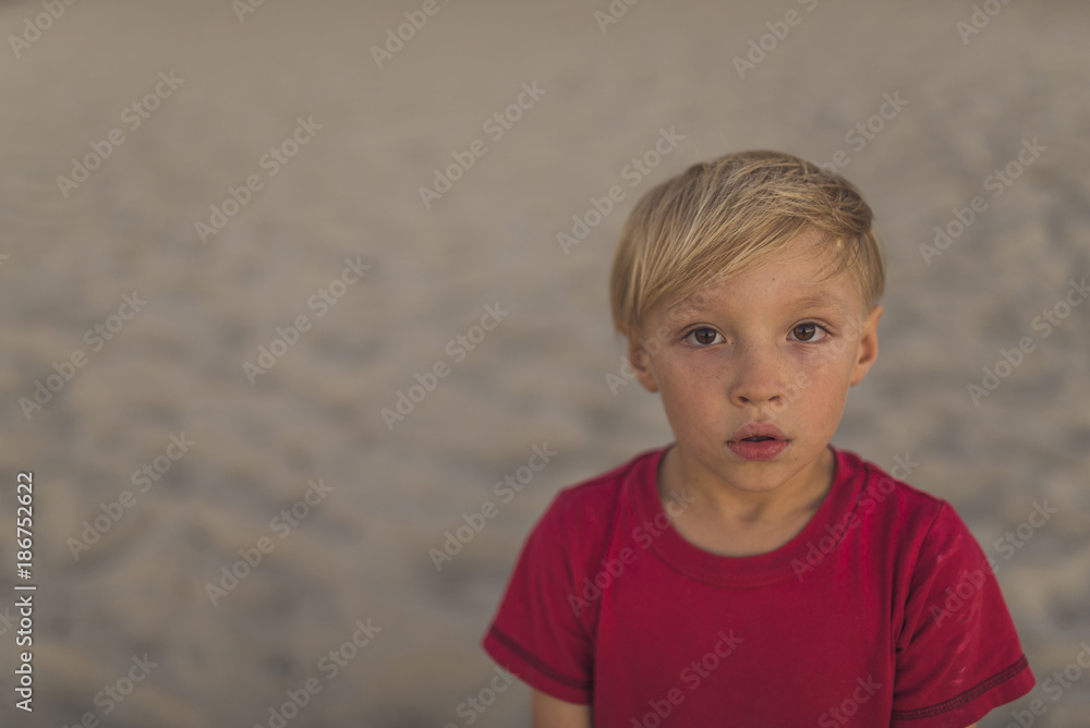 Portrait of boy standing at beach Portrait of boy standing at beach