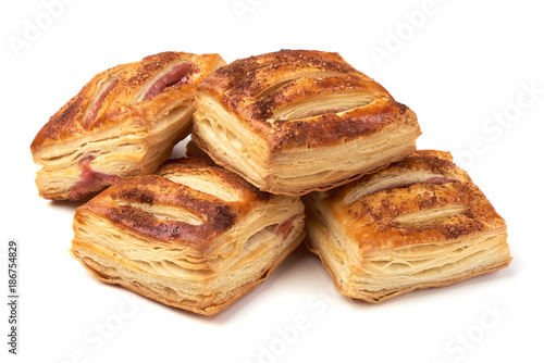 Freshly baked buns, close-up, isolated on white background.