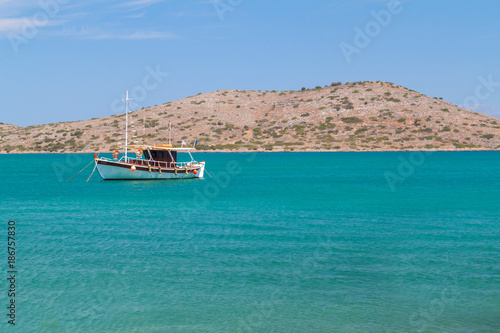 Fishing boat at the coast of Crete, Greece © kwiatek7