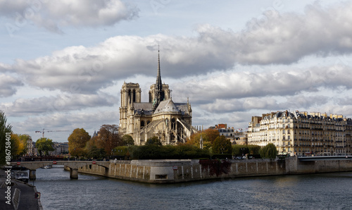 Notre Dame de Paris and Seine river viewed from Tournelle Bridge in Paris, France, October 28, 2017