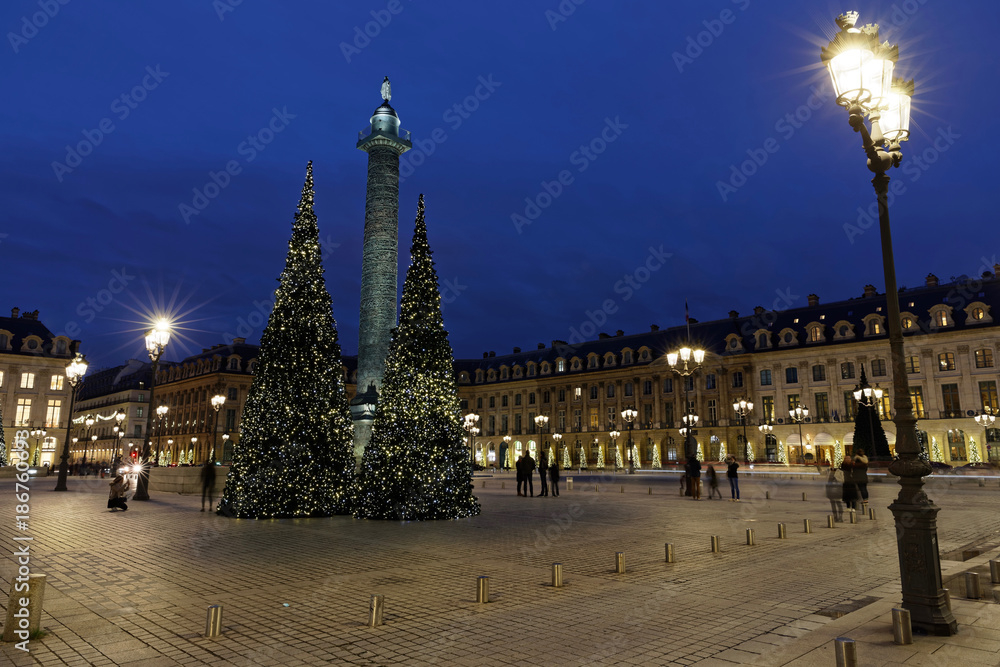 Paris, France - December 17, 2017: Christmas trees at Place Vendome in Paris by night