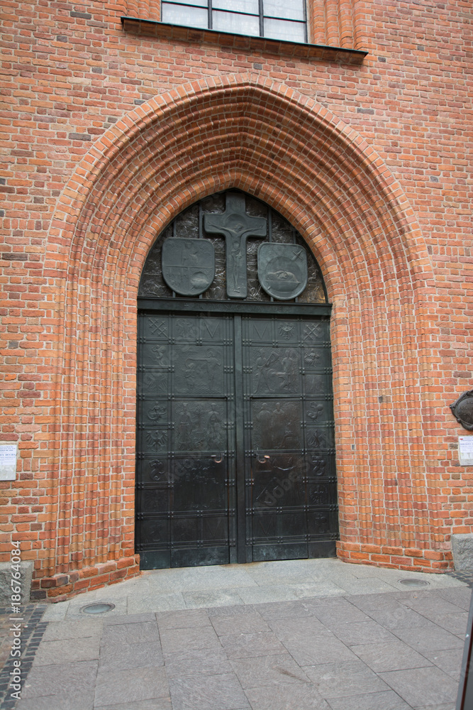 The arches of the door of a church.